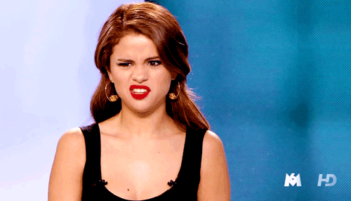 Selena-Gomez-GIF-saying-come-on-grossed-out-face-blue-background