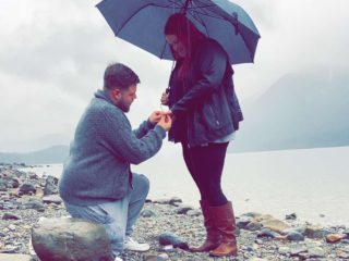 man proposes to woman during overcast day